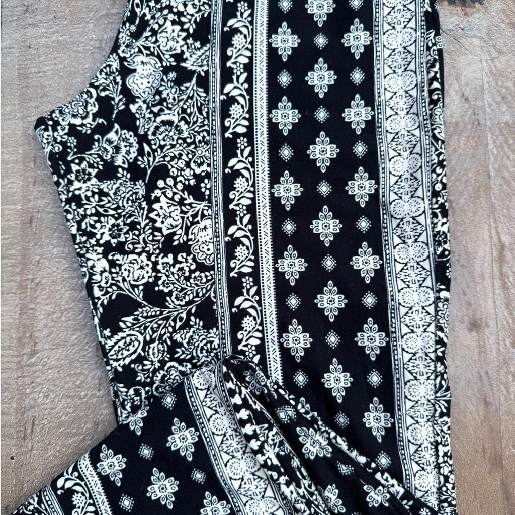 2 Pair Of Leggings H&M Black & Floral Black White Leggings Size S