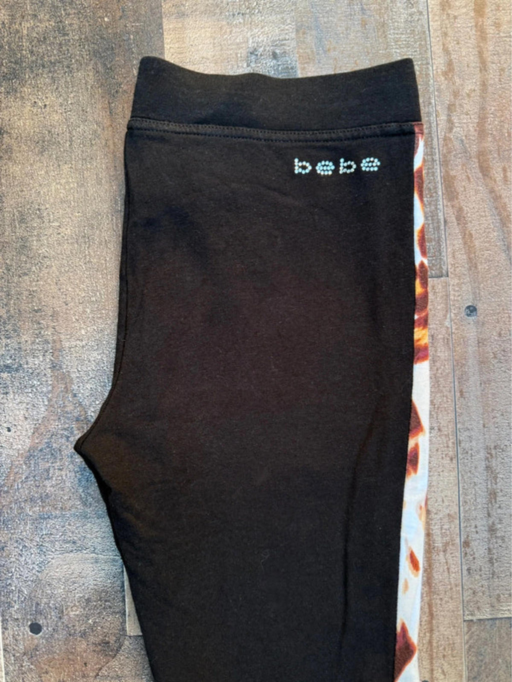Bebe Black Pant Length Womens Leggings With A Fun Design Size M