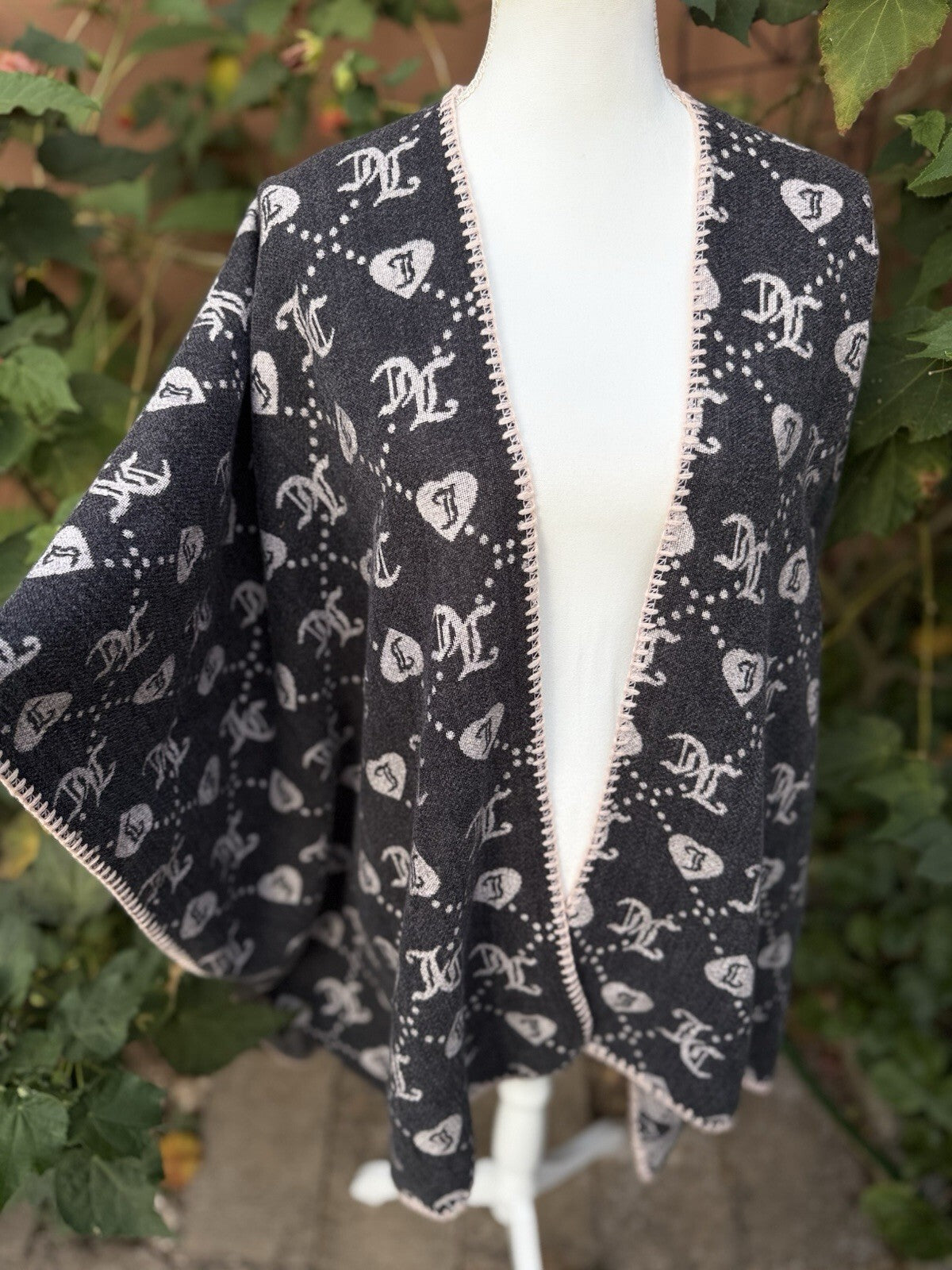Juicy Couture reversible gray knit logo poncho shawl wrap, new with tags, detail view