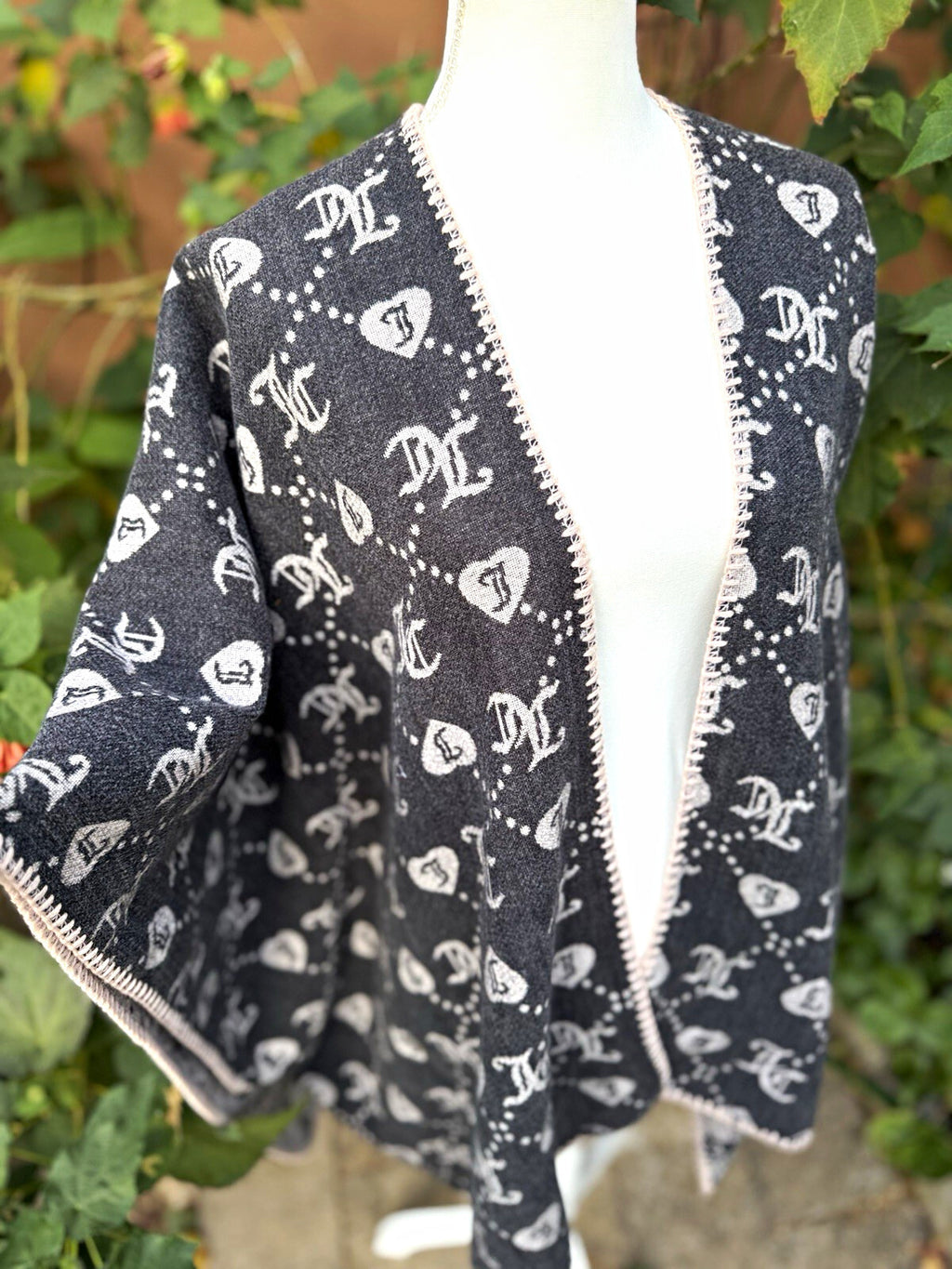Juicy Couture reversible gray knit logo poncho shawl wrap, new with tags, front view